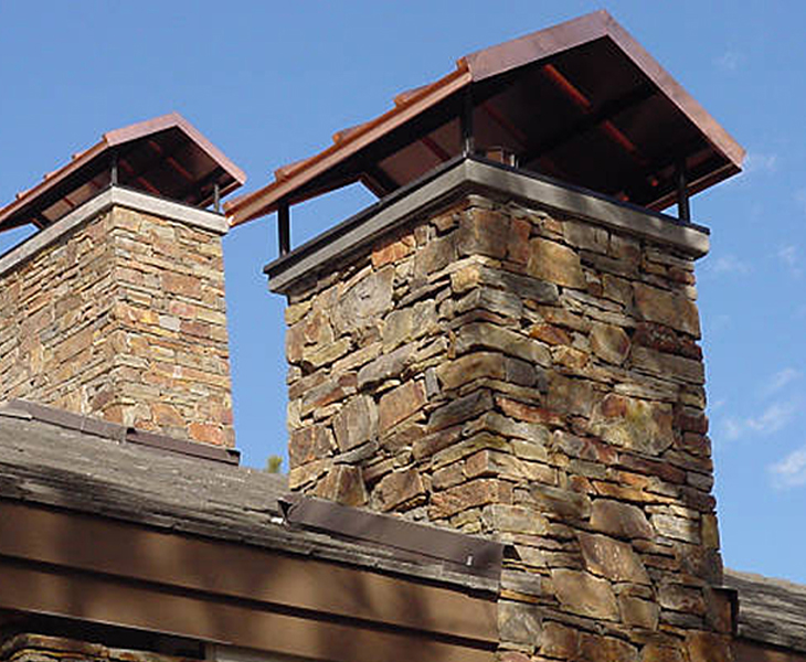 Chimney Sweep: Above and Beyond Home Services Inc - Thorough cleaning and maintenance for optimal chimney performance.